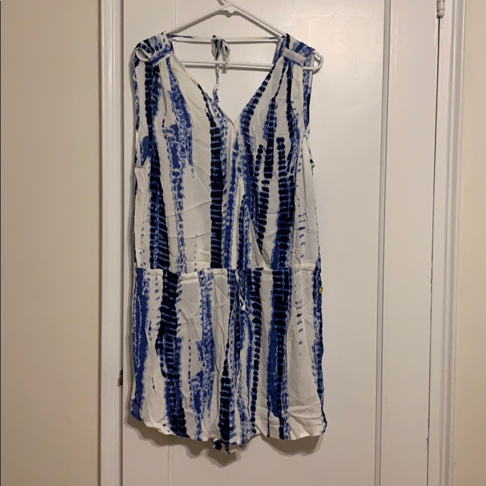 Blue and white v neck romper. Ties a back size L